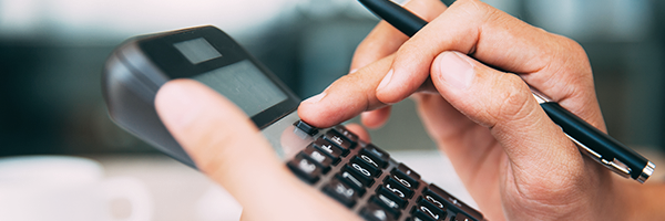 Entering numbers into a calculator.